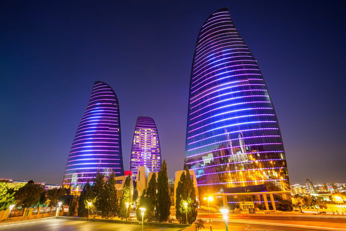 Baku's illuminated Flame Towers at night